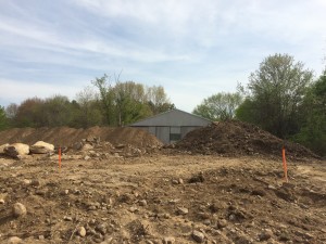 Dirt that has since been moved - note the orange stakes - this is where in the other photo the orange painted rocks are 