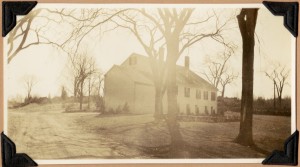 Backside of the house - the photographer is standing in the middle of south street, approximately where the brook goes under the road.  Note, according to Alice Koford, the town of Carlisle was generally electrified in 1918 and the streets at this end of town were paved in 1938