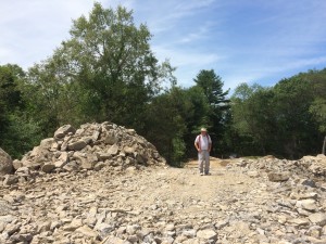 Looking down the big pile of rubble towards the driveway - my Dad in the middle distance