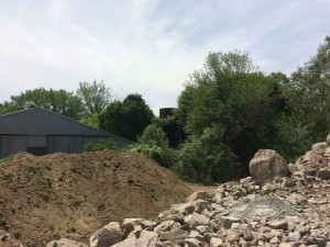 Big rocks and dirt pile - this is actually over the property line and the Kimballs have been quite gracious in allow us to store material there while construction is going on