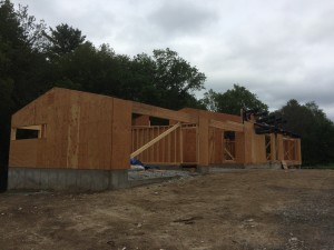 Progress continues forward. In the foreground is the wood/metal shop (aka - the Garage). In the middle ground is the carport and then the front door and living room area