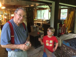 Grandpa Fohl and nephew Mason showing off the cookbook page holder we just completed for my SiL. Mild steel 